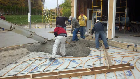 how do concrete contractors charge